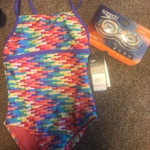 Speedo size 10 bathing suit NWT and googles